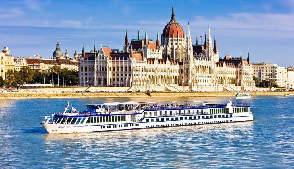 Cruise ship passing the Parliament on the Danube, Budapest, Hungary