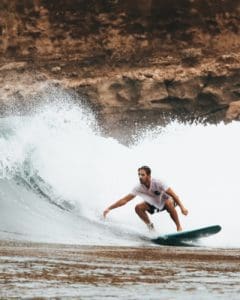 man surfing on ocean waves